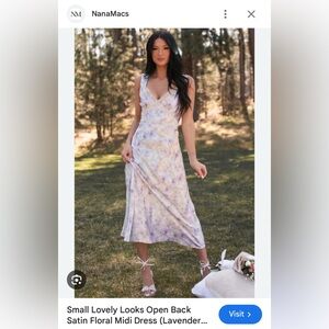 Worn once, light lavender multi color dress. Like new